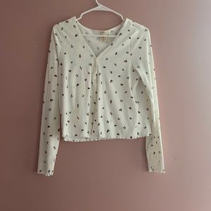 cropped light sweater with tank top attached inside